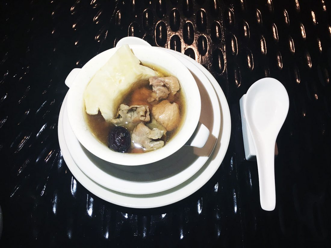 Double Boiled Chicken Consommé with Sliced Fish Maw, Trumpet shell and Ginseng