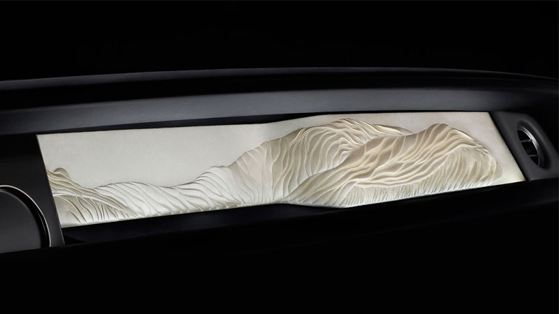 Abstract, sculpted silk applique based on the Rolls-Royce hood ornament
