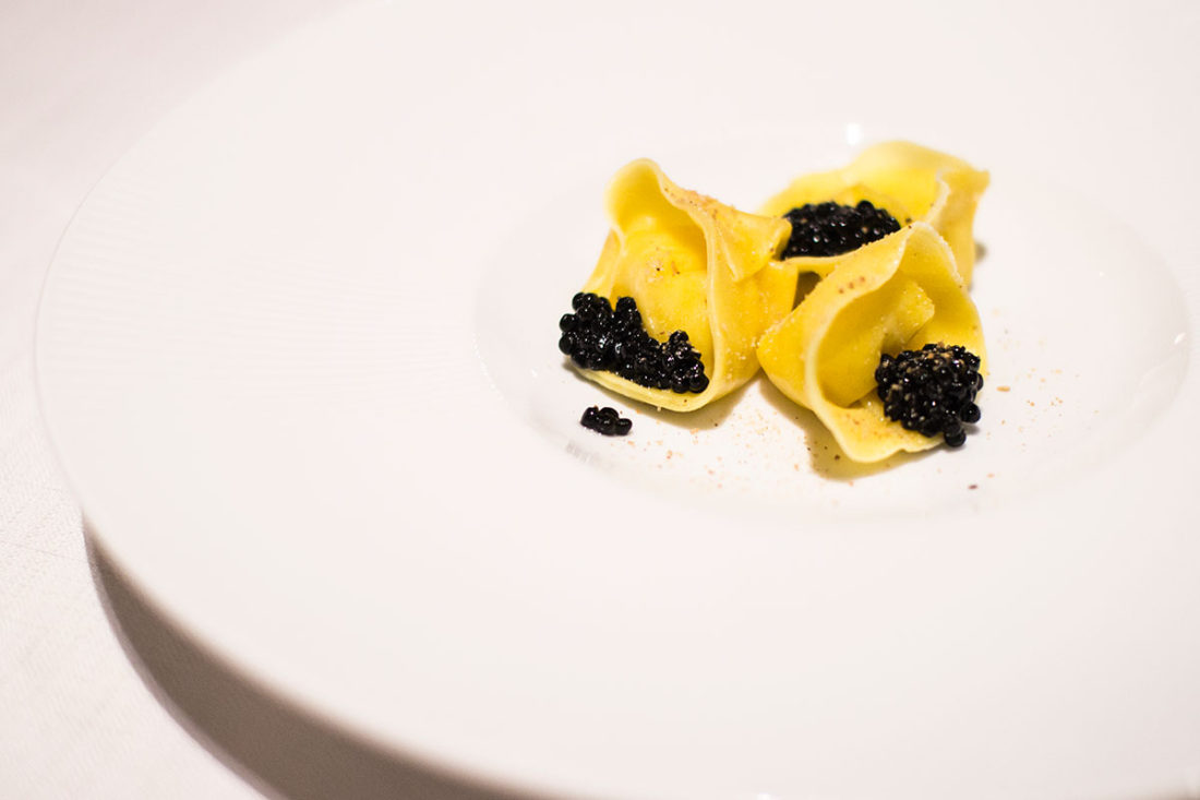 Tortelli with parmesan emulsion and black truffle caviar