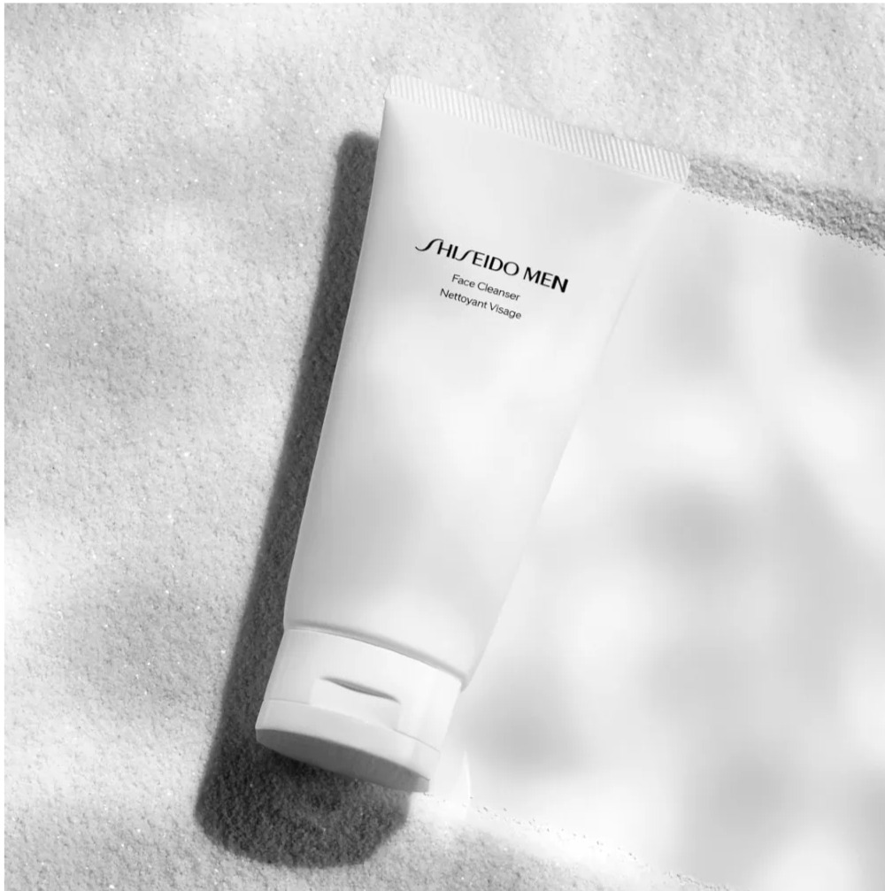 A mood shot of the Shiseido Men Face Cleanser, representing an essential product for a basic men's skincare routine.