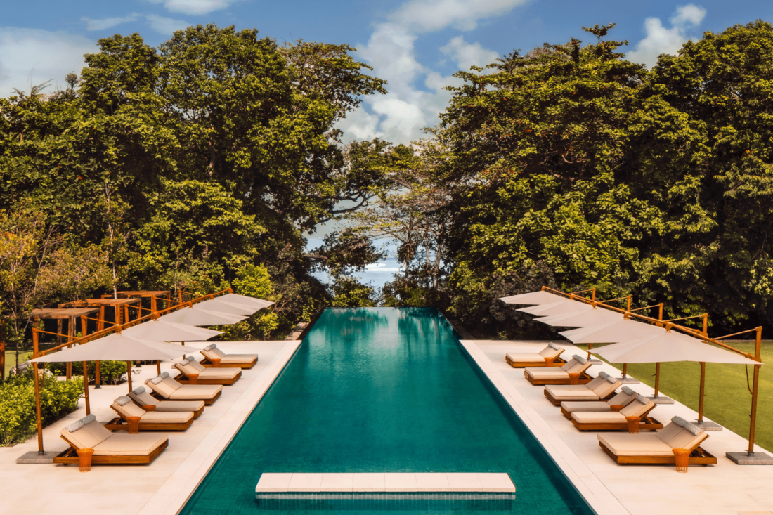 The poolside overlooks the South China Sea at One&Only Desaru Coast. 