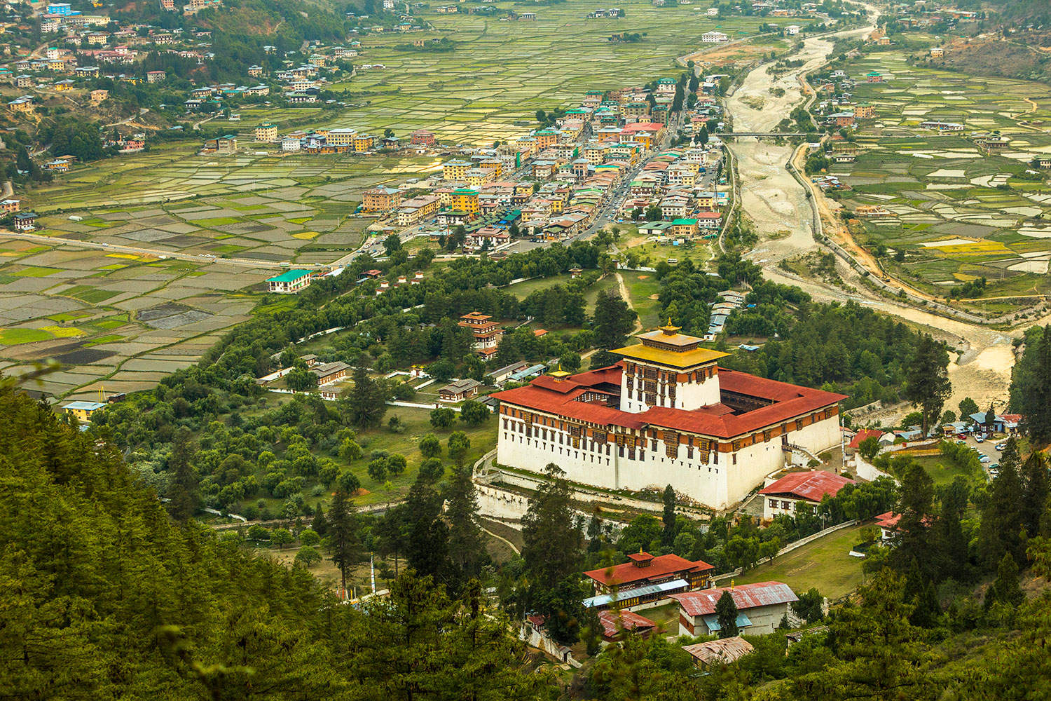 The view of Paro Valley and Paro Dzong in Bhutan. 