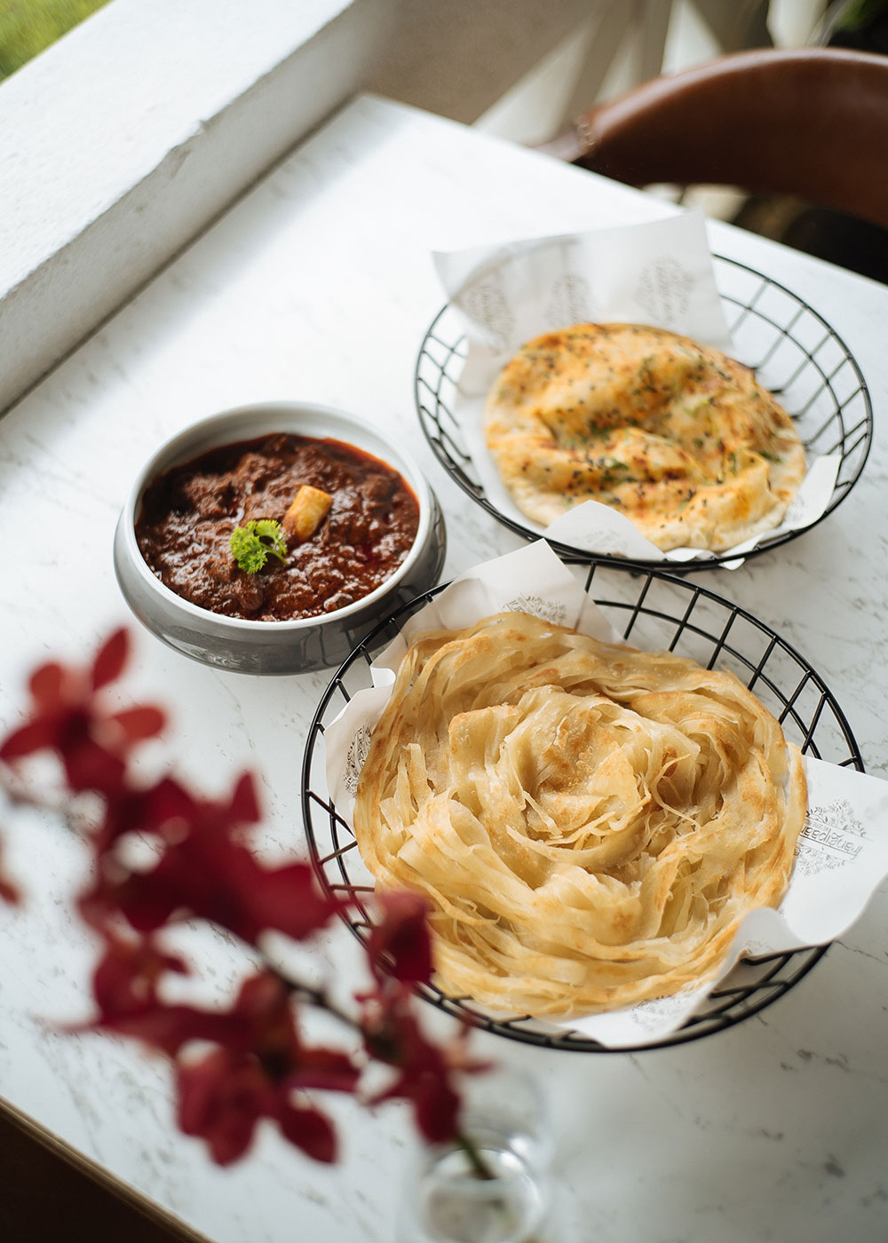 Frangipaani KL Mutton Rogan Josh, Kulcha and Laccha Paratha.