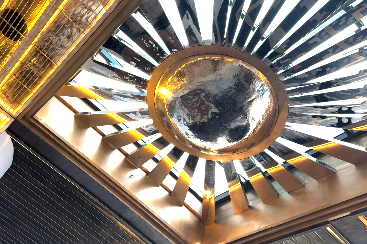 Brass sun motif embedded in the roof.