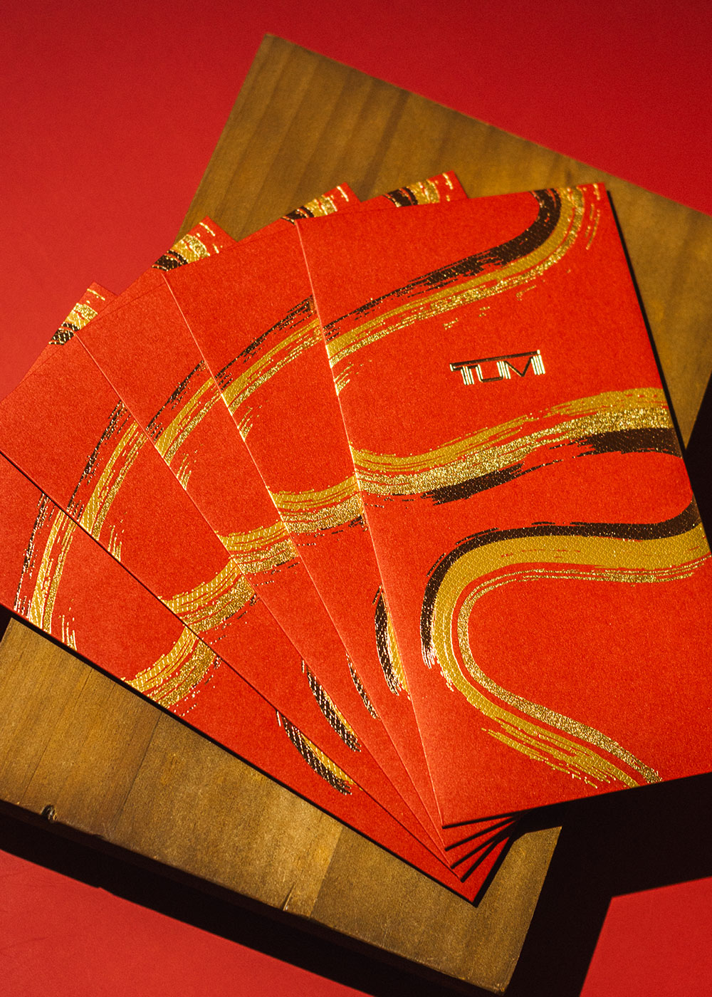 TUMI angpow red packets.