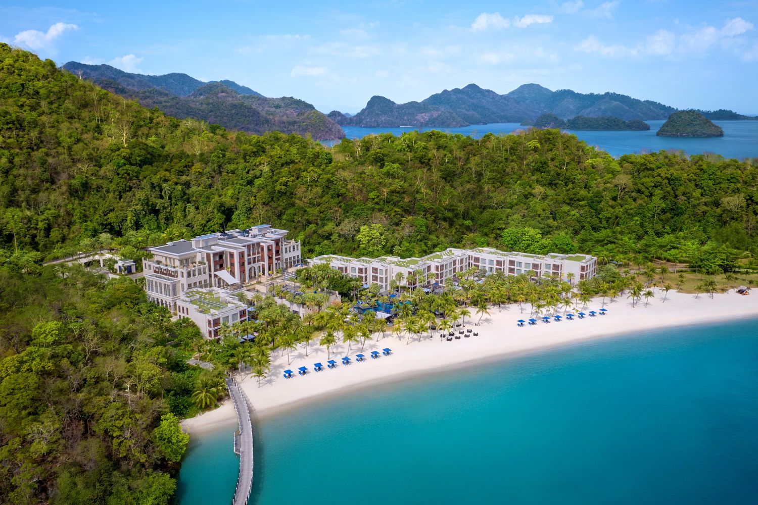 The resort looks out over a private beach to the Andaman Sea.