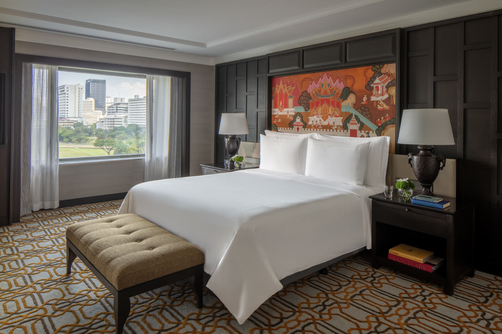 A Siam Suite at Anantara Siam Bangkok looking over the Royal Bangkok Sports Club racecourse.