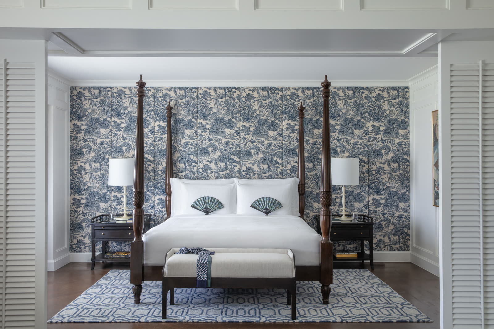 The four-poster main bedroom of the Two Bedroom Jim Thompson Explorer Suite at Anantara Siam Bangkok.