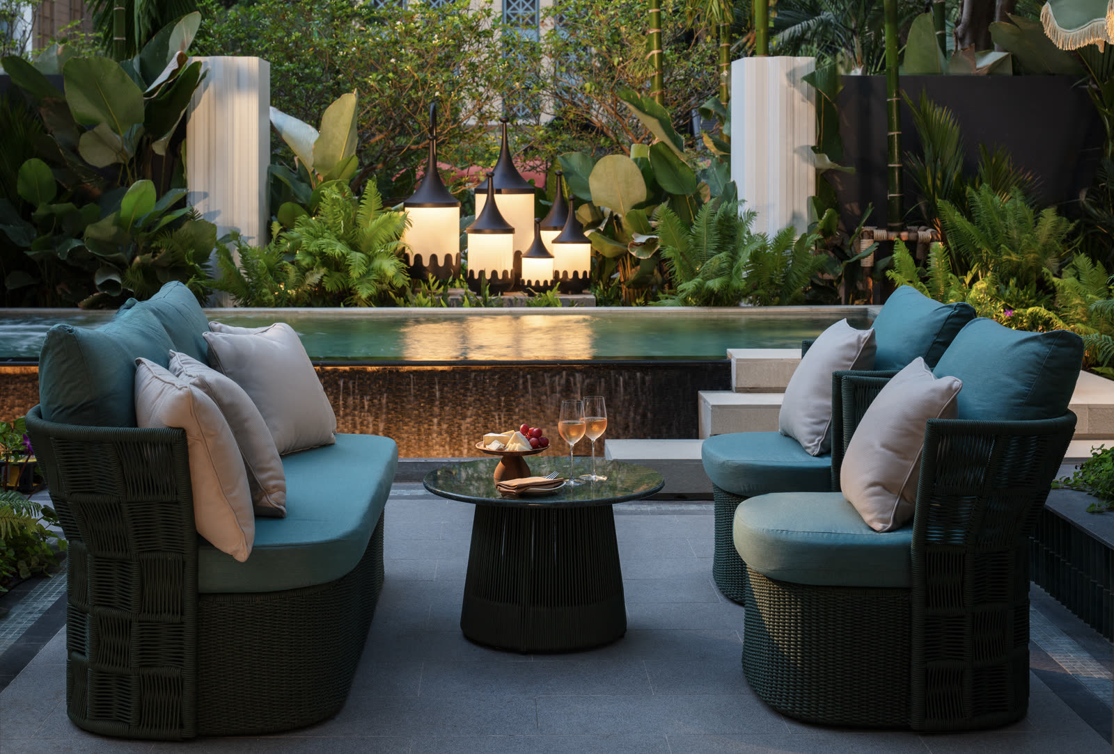 Evening on the terrace of a Garden Pool Villa at Anantara Siam Bangkok, lanterns lit beside the private pool.
